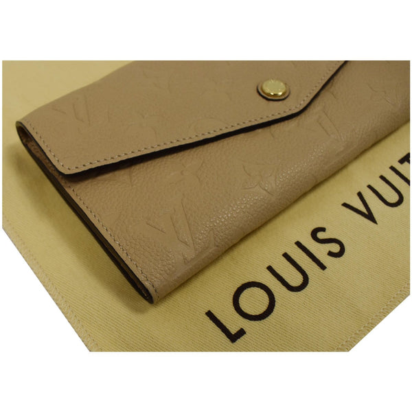 LOUIS VUITTON Curieuse Monogram Empreinte Leather Wallet Bronze