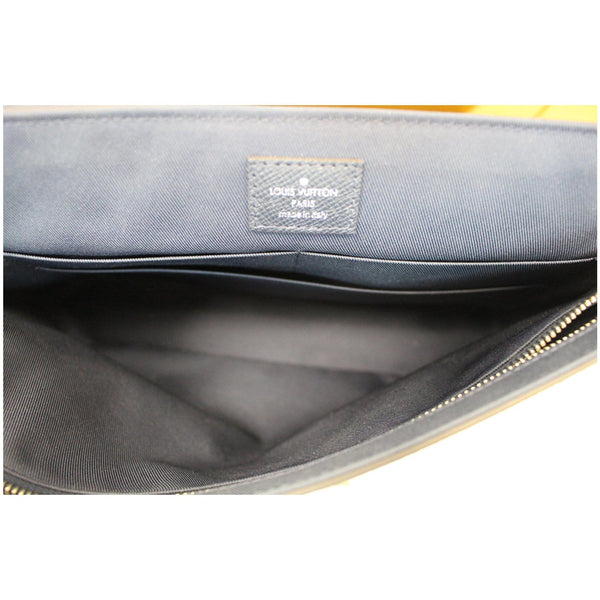 Louis Vuitton Roman MM Taiga Leather Messenger Bag tag