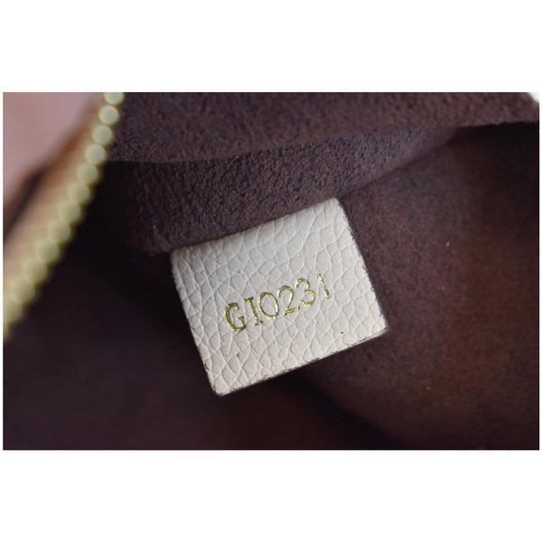 LOUIS VUITTON Empreinte Monogram Neverfull MM Pochette Wristlet Cream