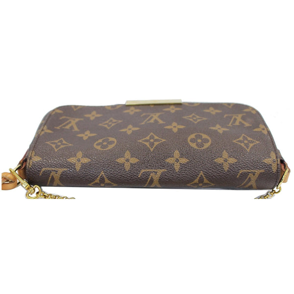 focused look Lv Favorite PM Monogram Canvas Elbow Bag