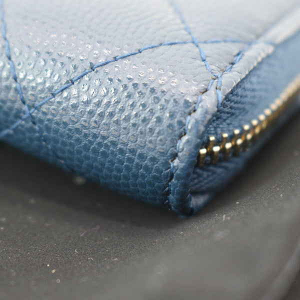 CHANEL Caviar Quilted Small Zip Around Wallet Blue