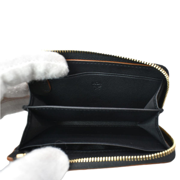 MCM Aren Mini Embossed Monogram Zip Wallet Black