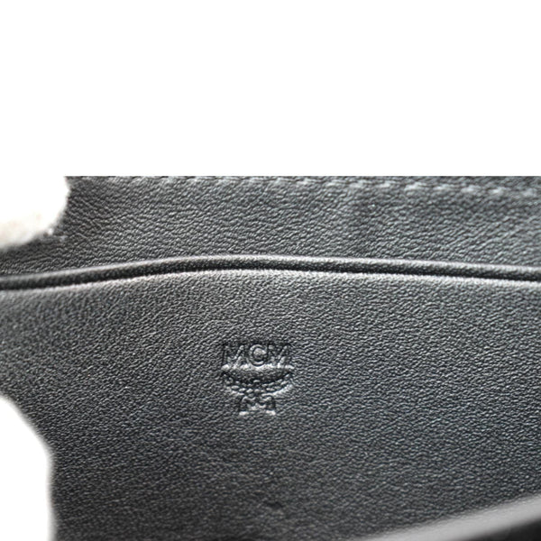 MCM Aren Mini Embossed Monogram Zip Wallet Black