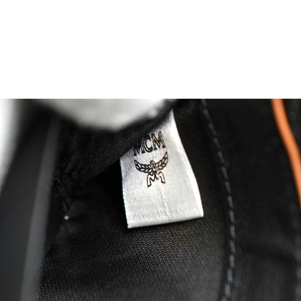 MCM Aren Mini Embossed Monogram Zip Wallet Black