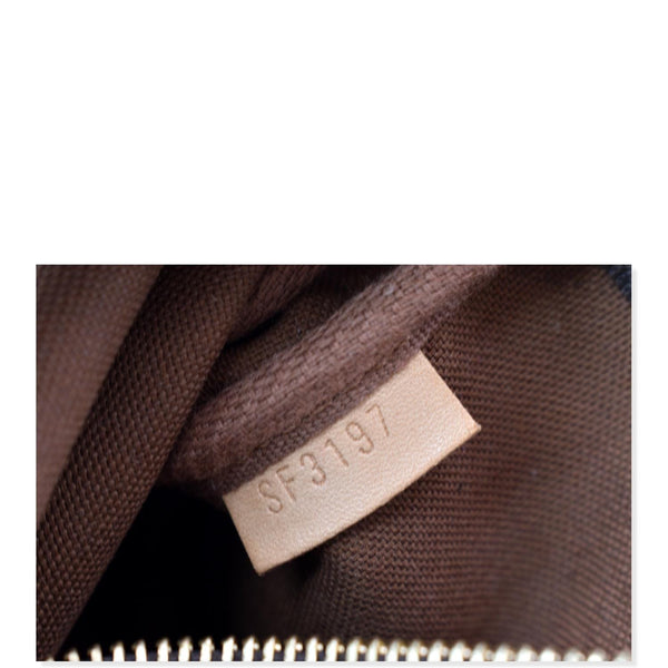 LOUIS VUITTON Animation Pochette Monogram Canvas Accessoires Pouch Brown