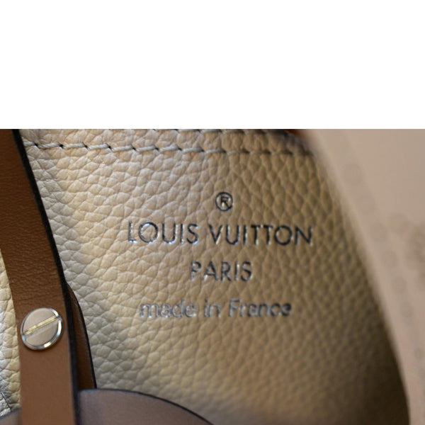 LOUIS VUITTON Carmel Mahina Leather Hobo Bag Creme