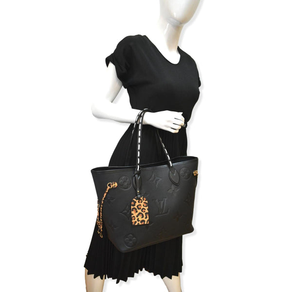 LOUIS VUITTON Neverfull MM Wild At Heart Monogram Giant Tote Bag Black