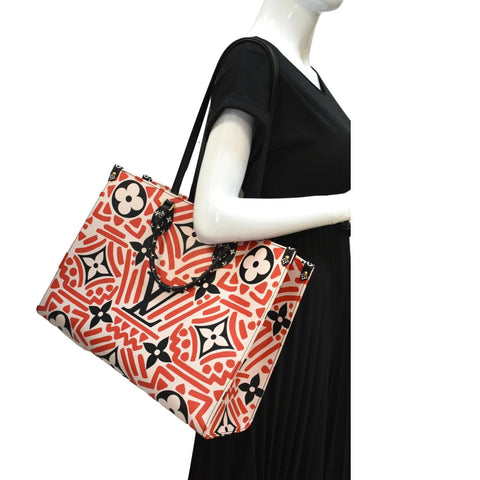 LOUIS VUITTON Onthego GM Crafty Monogram Giant Canvas Shoulder Bag Red - Hot Deals