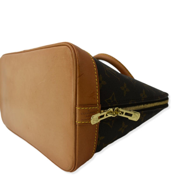 LOUIS VUITTON Alma Monogram Canvas Satchel Bag Brown