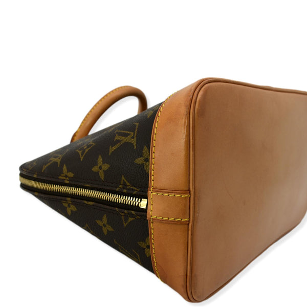LOUIS VUITTON Alma Monogram Canvas Satchel Bag Brown