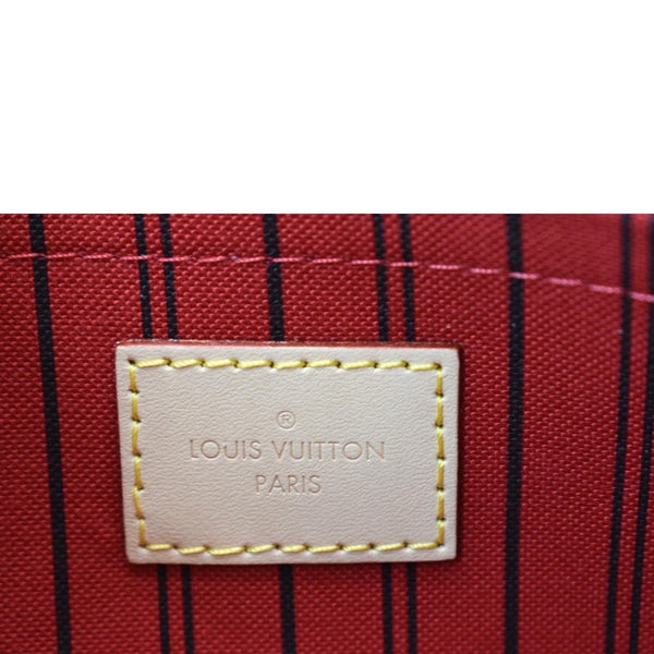 LOUIS VUITTON Neverfull Monogram Canvas Pochette Wristlet Pouch Brown