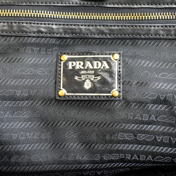 PRADA Vitello Daino Logo Embossed Leather Hobo Bag Black