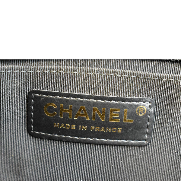 CHANEL Medium Boy Flap Caviar Quilted Leather Shoulder Bag Black