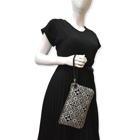 LOUIS VUITTON Since 1854 Neverfull Jacquard Wristlet Pouch Grey