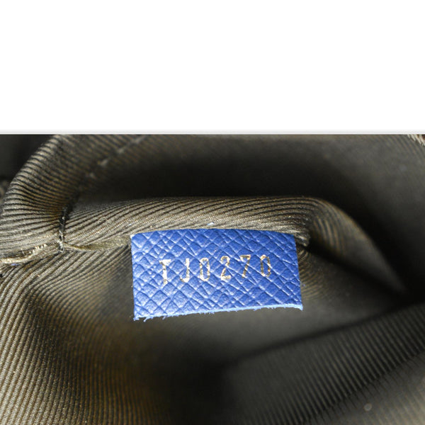 LOUIS VUITTON Discovery Taiga Monogram Leather Backpack Blue