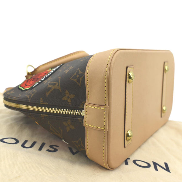 Louis Vuitton Alma PM Patches Canvas Satchel Bag - Left Side