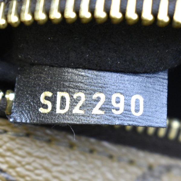 LOUIS VUITTON Metis Pochette Reverse Monogram Canvas Crossbody Bag Brown