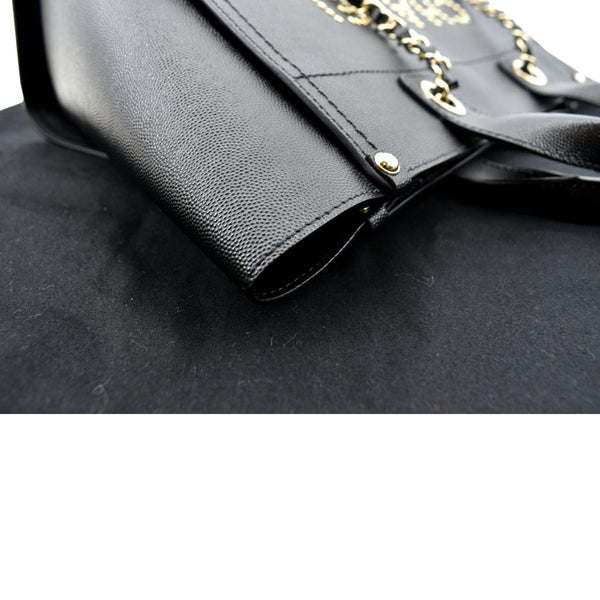 Chanel Studded Deauville Caviar Leather Tote Bag in Black - Right Side