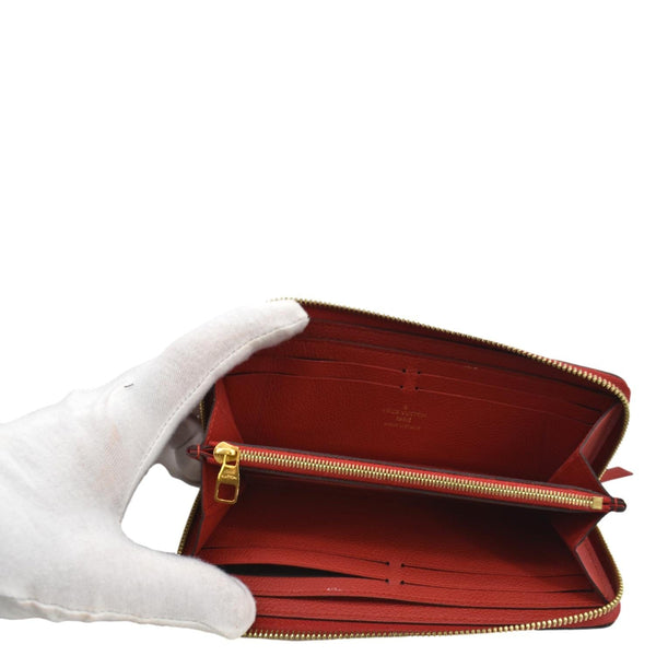 LOUIS VUITTON Clemence Empreinte Leather Wallet Red