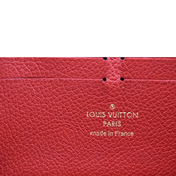 LOUIS VUITTON Clemence Empreinte Leather Wallet Red