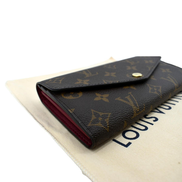 Louis Vuitton Sarah Monogram Canvas Wallet in Brown - Bottom Left