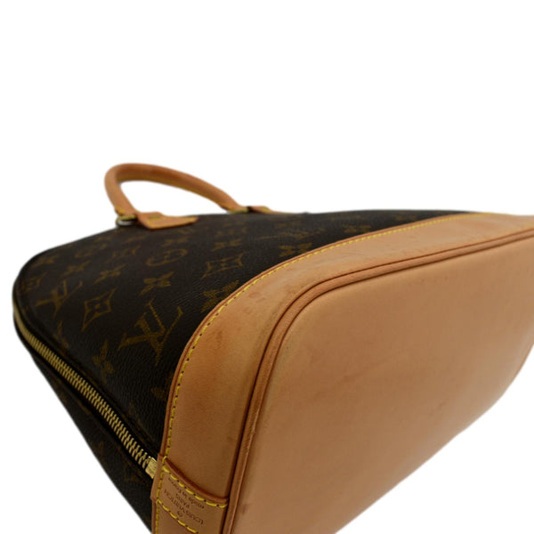 Louis Vuitton Alma PM Monogram Canvas Satchel Bag Brown - Left Side