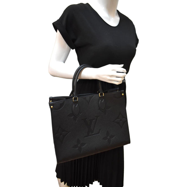 LOUIS VUITTON Onthego MM Monogram Empreinte Leather Shoulder Bag Black
