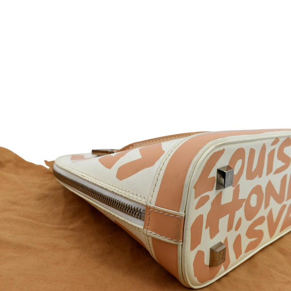 Louis Vuitton Alma Graffiti Leather Satchel Bag White - Bottom Left