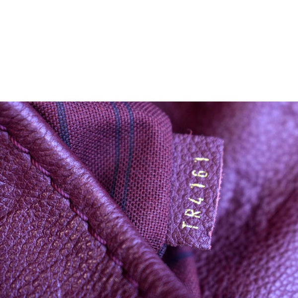 LOUIS VUITTON Artsy MM Empreinte Leather Hobo Bag Red