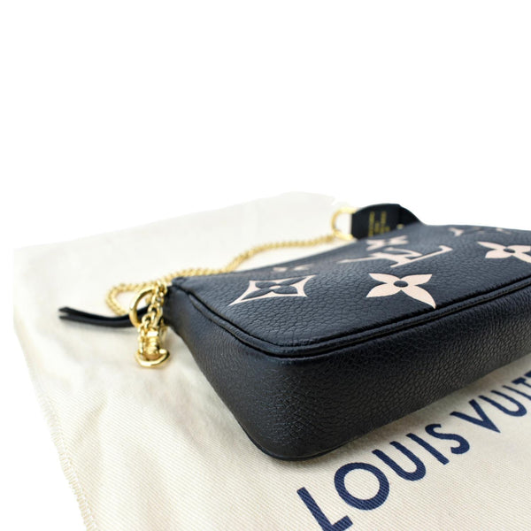 LOUIS VUITTON Mini Pochette Bicolor Monogram Empreinte Accessories Pouch Black