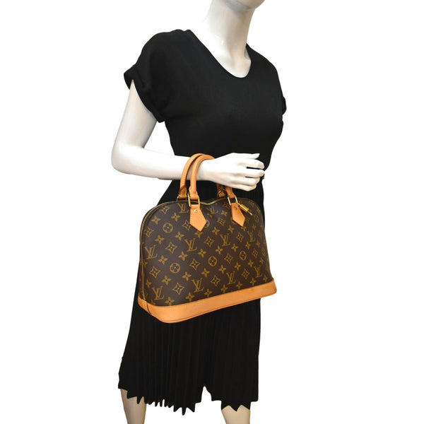 Louis Vuitton Alma PM Monogram Canvas Satchel Bag Brown - Side