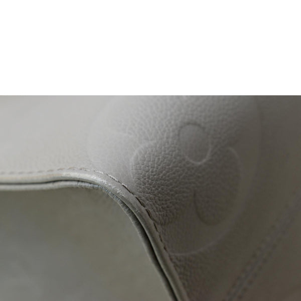 LOUIS VUITTON Onthego MM Monogram Empreinte Shoulder Bag Tourterelle - Hot Deals