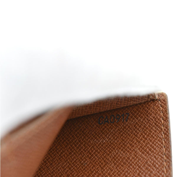 Louis Vuitton Fold Over Monogram Canvas Wallet in Brown - Serial Number