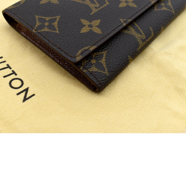 Louis Vuitton Fold Over Monogram Canvas Wallet in Brown - Bottom Left