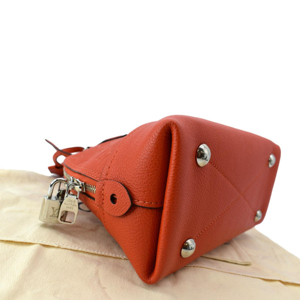 LOUIS VUITTON Neo Alma BB Monogram Empreinte Crossbody Bag Orange