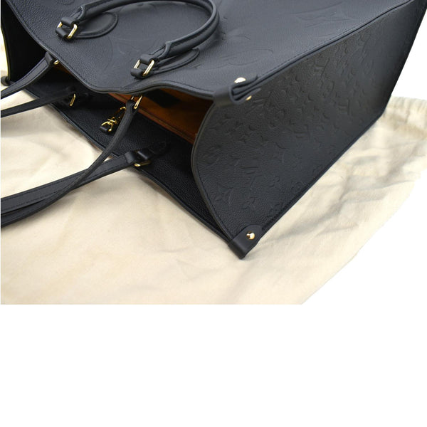 Louis Vuitton Onthego GM Monogram Empreinte Tote Bag - Left Side