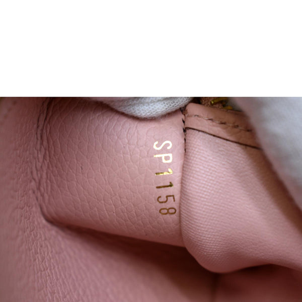 LOUIS VUITTON Monogram Empreinte Leather Zippy Wallet Rose Poudre Pink