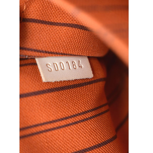 LOUIS VUITTON Neverfull Monogram Canvas Pochette Wristlet Pouch Brown