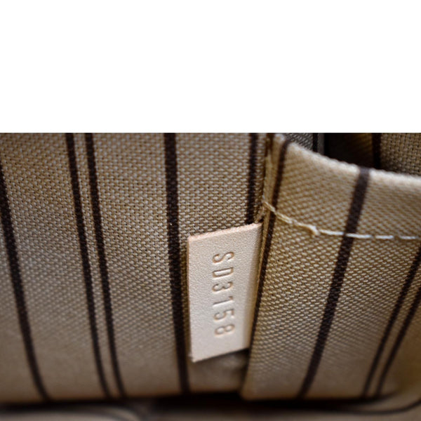 LOUIS VUITTON Neverfull Monogram Canvas Pochette Wristlet Pouch Brown