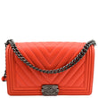 CHANEL Medium Boy Flap Chevron Quilted Calfskin Shoulder Bag Red