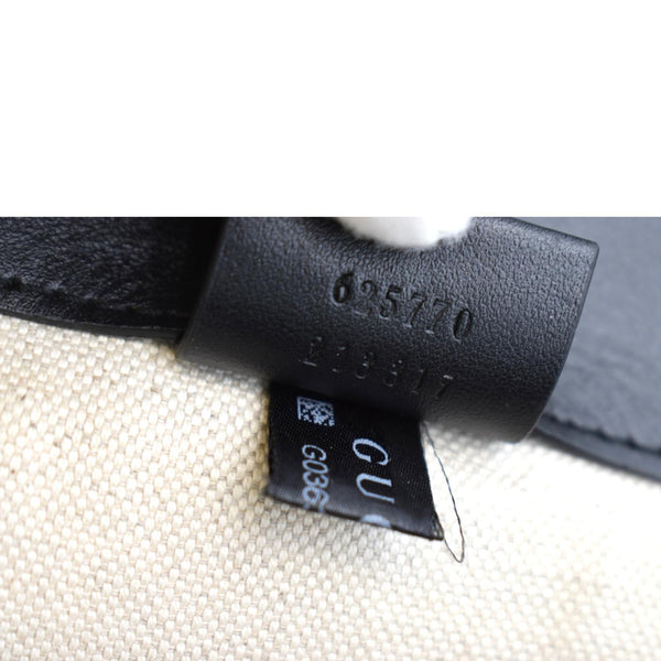 Gucci GG Embossed Leather Backpack in Black Color - Tag