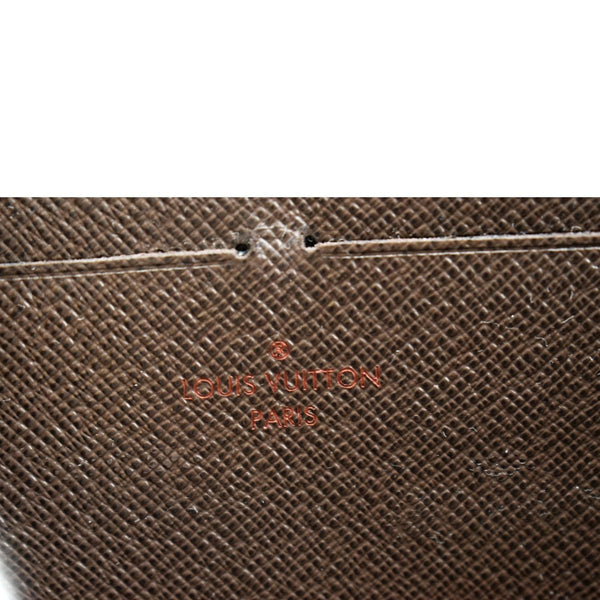 LOUIS VUITTON Zip Around Damier Ebene Wallet Brown