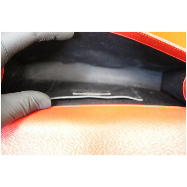 YVES SAINT LAURENT Cassandre Grain De Poudre Clutch Red