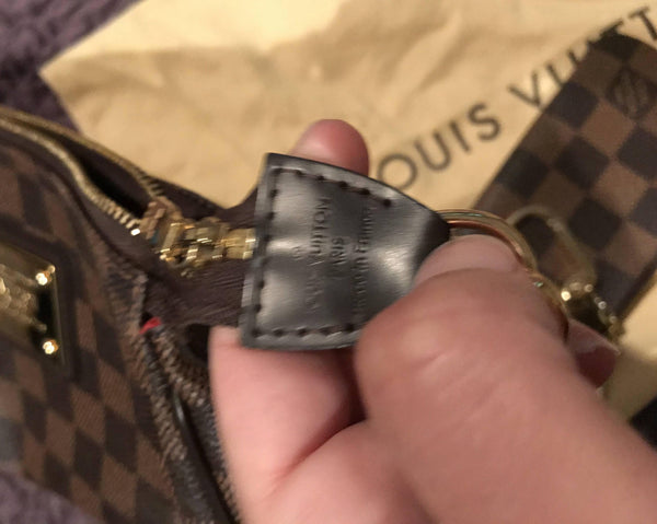 Louis Vuitton Pochette Eva Damier Ebene Clutch logo preview