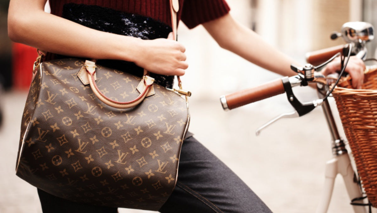 Why are so many middle class women buying Louis Vuitton handbags