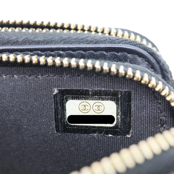 CHANEL CC Filigree Double Zip Quilted Caviar Leather Crossbody Bag Black