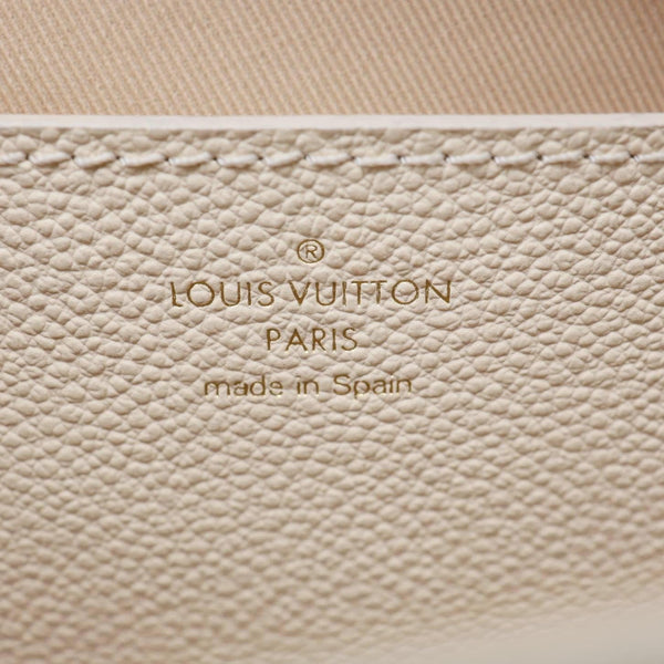 LOUIS VUITTON Metis Monogram Empreinte Leather Wallet On Chain Cream