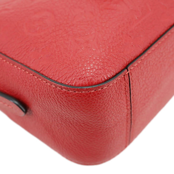 LOUIS VUITTON Saintonge Monogram Empreinte Leather Crossbody Bag Red
