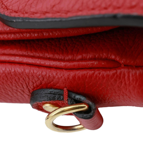 LOUIS VUITTON Metis Pochette Empreinte Leather Crossbody Bag Red