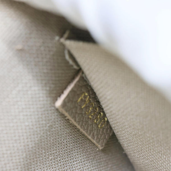 LOUIS VUITTON Felicie Pochette Giant Monogram Empreinte Crossbody Bag Bicolor